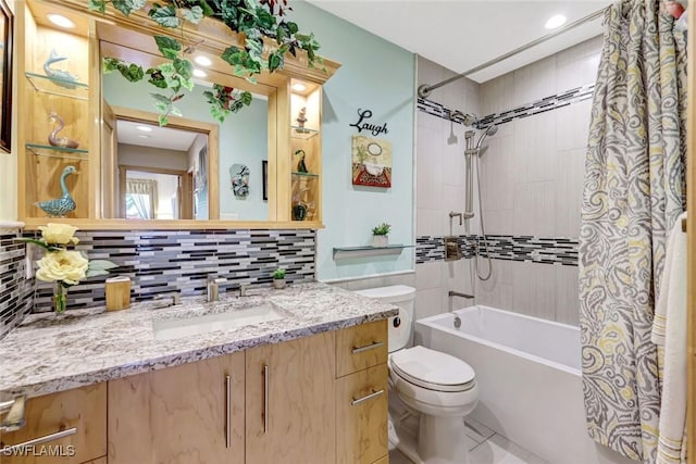 7105 Quail Run Ct W Unit 4, Fort Myers, FL 33908 - full bath featuring shower / bath combo, vanity, and decorative backsplash