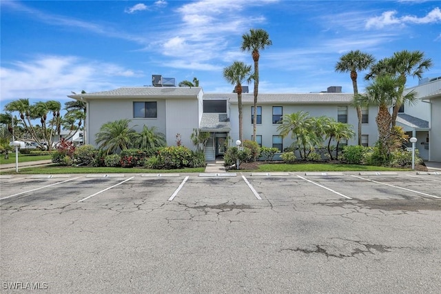7105 Quail Run Ct W Unit 4, Fort Myers, FL 33908 - view of property with uncovered parking