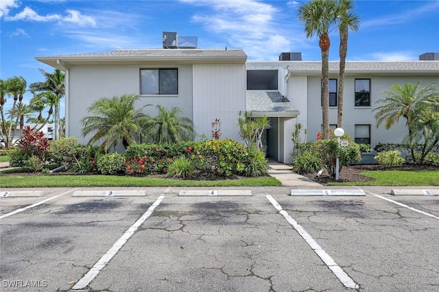 7105 Quail Run Ct W Unit 4, Fort Myers, FL 33908 - view of property featuring uncovered parking