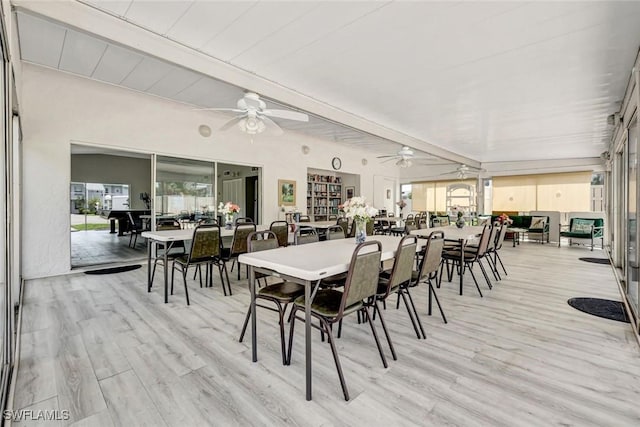 7105 Quail Run Ct W Unit 4, Fort Myers, FL 33908 - dining room featuring a ceiling fan, light wood finished floors, and beam ceiling