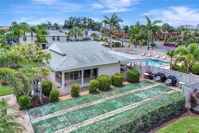 7105 Quail Run Ct W Unit 4, Fort Myers, FL 33908 - back of house with a shingled roof and stucco siding