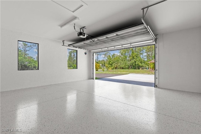 4371 47th Ave NE, Naples, FL 34120 - garage featuring a garage door opener