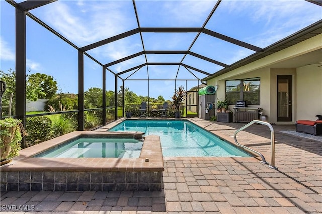 14659 Adina Ln, Fort Myers, FL 33905 - view of swimming pool featuring a patio, a pool with connected hot tub, and a lanai