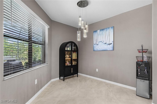 14659 Adina Ln, Fort Myers, FL 33905 - dining area with baseboards and light tile patterned floors