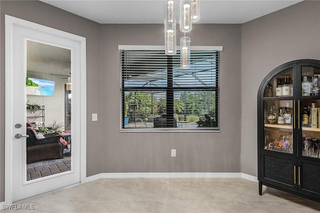 14659 Adina Ln, Fort Myers, FL 33905 - dining room featuring tile patterned floors and baseboards
