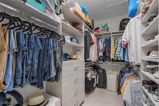 14659 Adina Ln, Fort Myers, FL 33905 - walk in closet with light tile patterned flooring and attic access