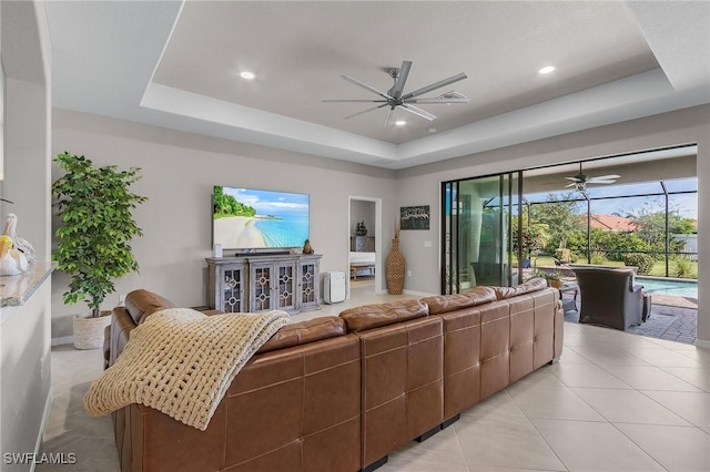 14659 Adina Ln, Fort Myers, FL 33905 - living room with a raised ceiling, a ceiling fan, recessed lighting, and light tile patterned floors