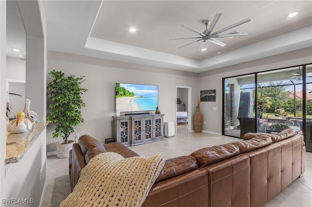 14659 Adina Ln, Fort Myers, FL 33905 - living room with ceiling fan, recessed lighting, a raised ceiling, and light tile patterned flooring