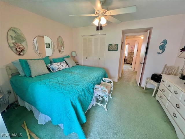 331 Joel Blvd Unit 109, Lehigh Acres, FL 33936 - bedroom featuring a closet, light carpet, and a ceiling fan
