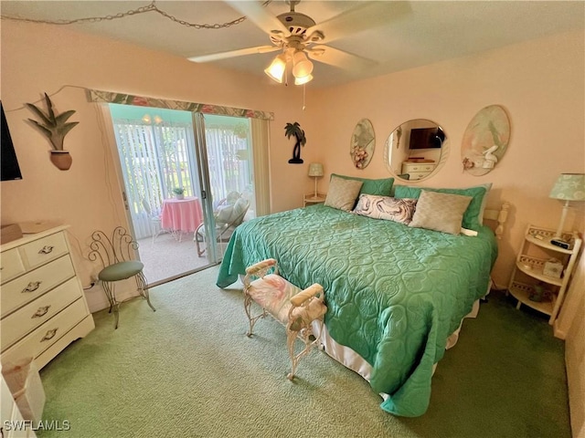 331 Joel Blvd Unit 109, Lehigh Acres, FL 33936 - bedroom featuring access to outside, carpet, and a ceiling fan