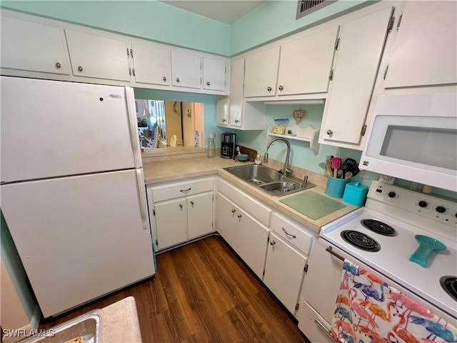 331 Joel Blvd Unit 109, Lehigh Acres, FL 33936 - kitchen featuring white appliances, dark wood-type flooring, light countertops, and white cabinetry