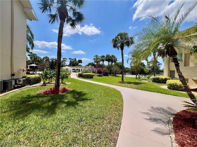 331 Joel Blvd Unit 109, Lehigh Acres, FL 33936 - view of community featuring a yard