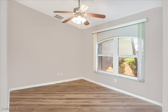 914 SW 9th Ct, Cape Coral, FL 33991 - spare room featuring ceiling fan and wood finished floors