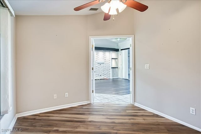 914 SW 9th Ct, Cape Coral, FL 33991 - spare room featuring a ceiling fan and wood finished floors