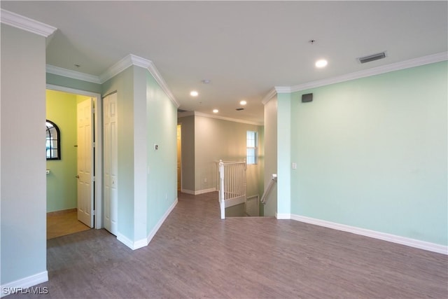 6533 Monterey Pt Unit 204, Naples, FL 34105 - spare room featuring wood finished floors, ornamental molding, recessed lighting, and a pendent fire sprinkler