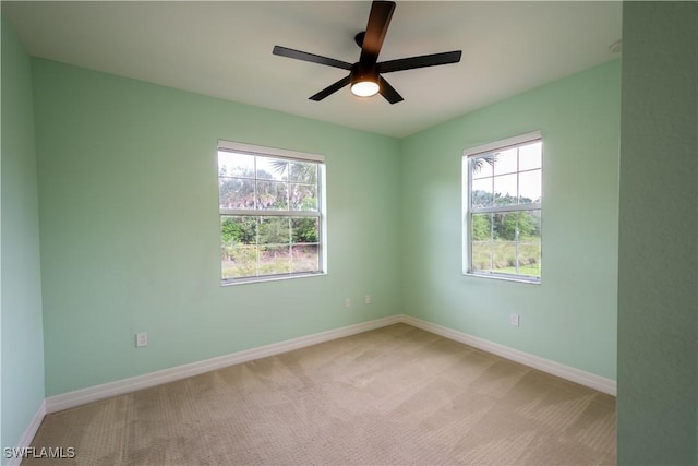 6533 Monterey Pt Unit 204, Naples, FL 34105 - unfurnished room with plenty of natural light, light carpet, and ceiling fan