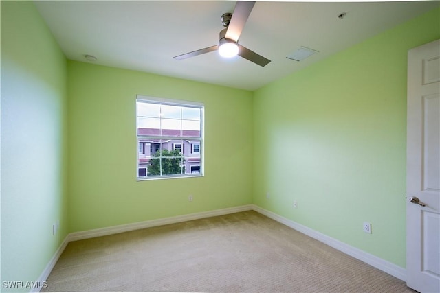 6533 Monterey Pt Unit 204, Naples, FL 34105 - empty room with ceiling fan, light carpet, and a smoke detector