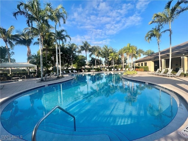 6533 Monterey Pt Unit 204, Naples, FL 34105 - community pool with a patio area