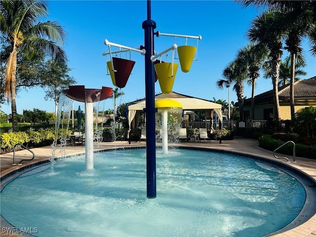 6533 Monterey Pt Unit 204, Naples, FL 34105 - community pool featuring a gazebo