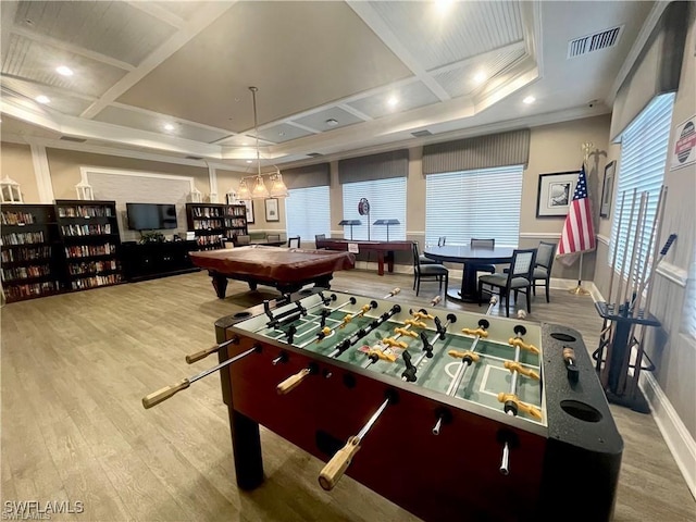 6533 Monterey Pt Unit 204, Naples, FL 34105 - game room featuring coffered ceiling, wood finished floors, plenty of natural light, ornamental molding, and beam ceiling