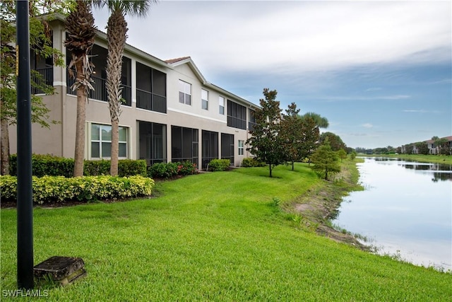 6533 Monterey Pt Unit 204, Naples, FL 34105 - view of green lawn with a water view