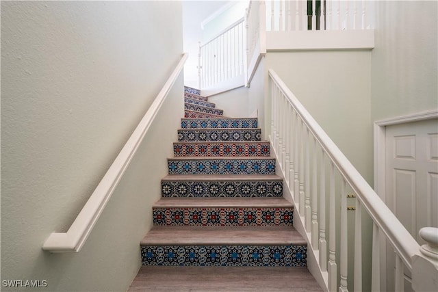 6533 Monterey Pt Unit 204, Naples, FL 34105 - stairway with wood finished floors