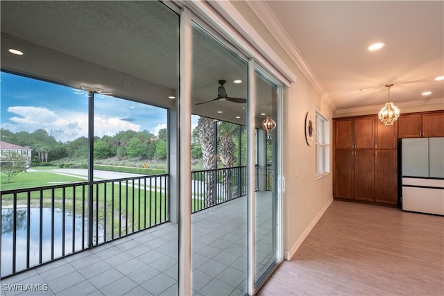 6533 Monterey Pt Unit 204, Naples, FL 34105 - unfurnished sunroom featuring a chandelier and plenty of natural light