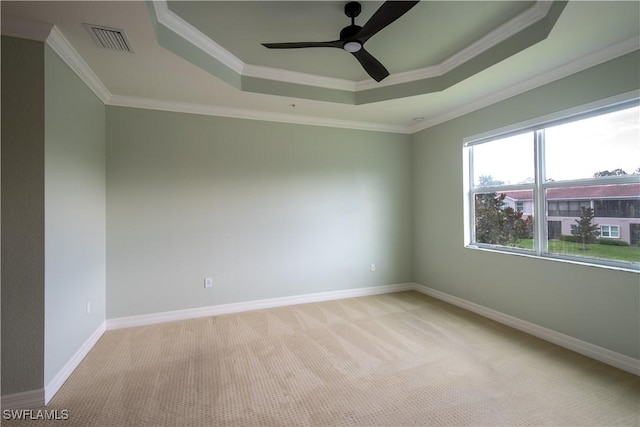 6533 Monterey Pt Unit 204, Naples, FL 34105 - unfurnished room with a raised ceiling, ceiling fan, light carpet, and ornamental molding