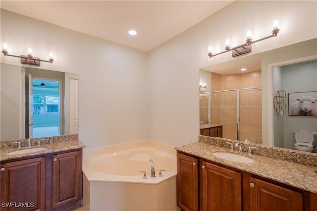 6533 Monterey Pt Unit 204, Naples, FL 34105 - full bath featuring a bath, a shower stall, and two vanities