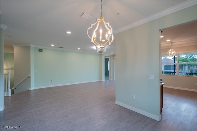 6533 Monterey Pt Unit 204, Naples, FL 34105 - empty room featuring a chandelier, crown molding, wood finished floors, and recessed lighting