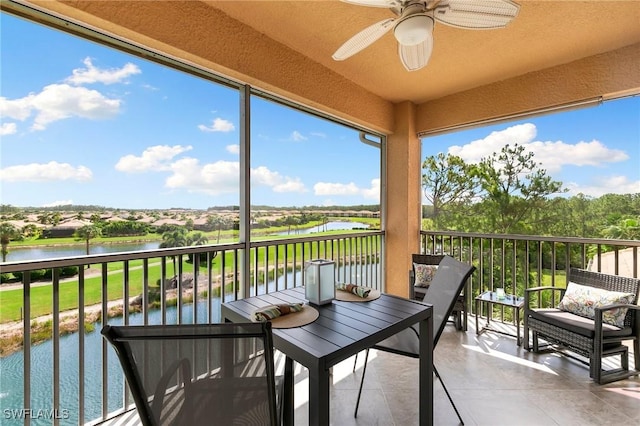 10720 Palazzo Way Unit 405, Fort Myers, FL 33913 - sunroom with ceiling fan, a water view, and tile patterned flooring