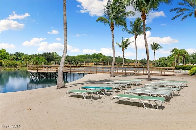10720 Palazzo Way Unit 405, Fort Myers, FL 33913 - view of home's community featuring a water view, a boat dock, and view of scattered trees