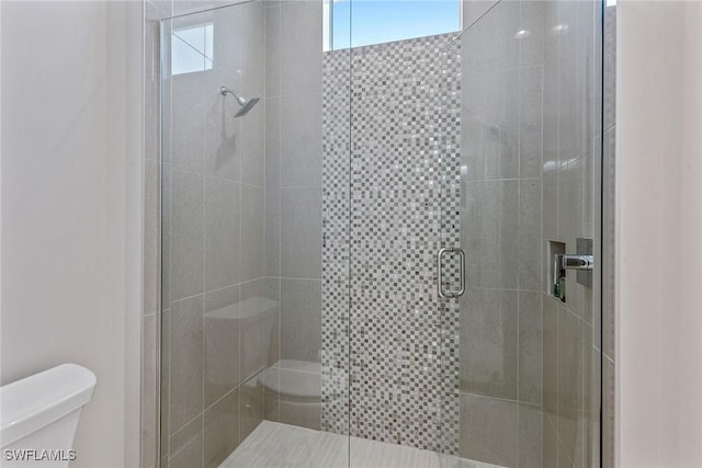3159 Heather Glen Ct, Naples, FL 34114 - bathroom featuring plenty of natural light and a stall shower