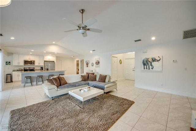 2812 SW 46th Ter, Cape Coral, FL 33914 - living area with vaulted ceiling, a ceiling fan, light tile patterned floors, and recessed lighting