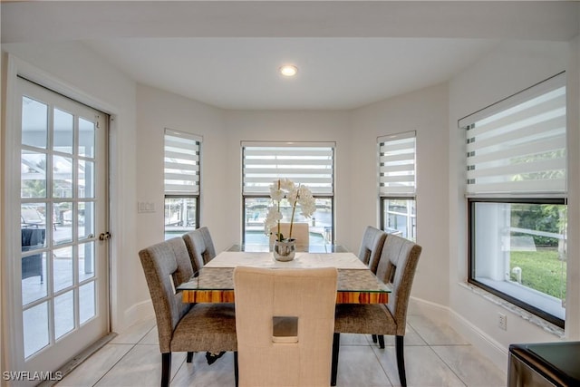 2812 SW 46th Ter, Cape Coral, FL 33914 - dining room with light tile patterned flooring, plenty of natural light, and recessed lighting