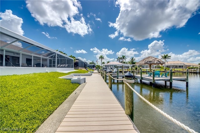 2812 SW 46th Ter, Cape Coral, FL 33914 - dock area with a lawn, a water view, and a residential view