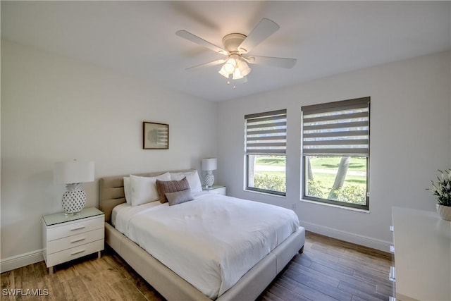 2812 SW 46th Ter, Cape Coral, FL 33914 - bedroom with wood finished floors and ceiling fan