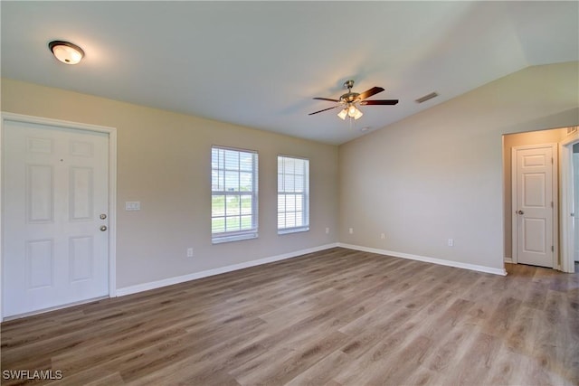 109 NE 11th St, Cape Coral, FL 33909 - unfurnished room featuring lofted ceiling, ceiling fan, and wood finished floors