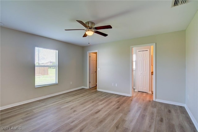109 NE 11th St, Cape Coral, FL 33909 - unfurnished bedroom with light wood-style flooring and a ceiling fan