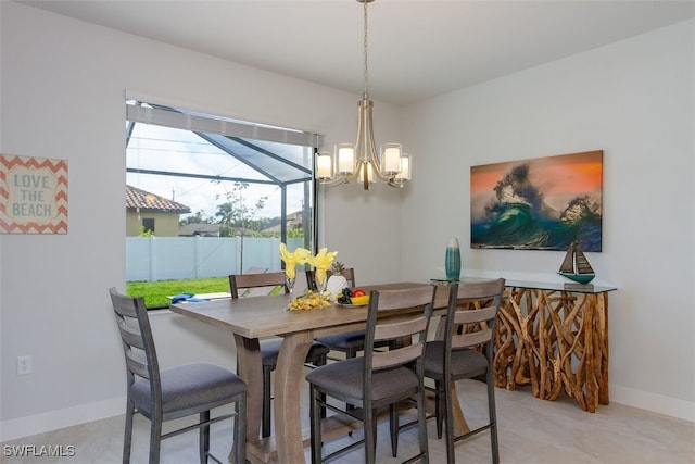5415 Agualinda Blvd, Cape Coral, FL 33914 - dining space featuring a chandelier and baseboards