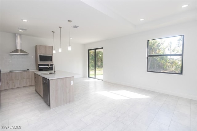 1456 Rugby Ln, Labelle, FL 33935 - kitchen with modern cabinets, wall chimney exhaust hood, black appliances, light brown cabinetry, and tasteful backsplash