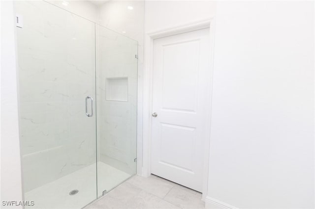 1456 Rugby Ln, Labelle, FL 33935 - bathroom with a marble finish shower and tile patterned flooring
