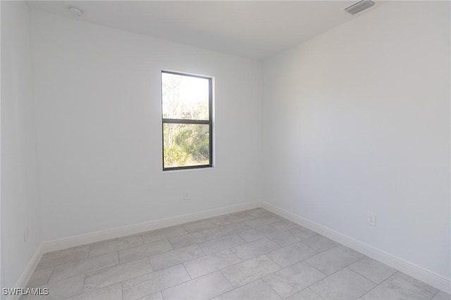 1456 Rugby Ln, Labelle, FL 33935 - empty room featuring baseboards and a smoke detector