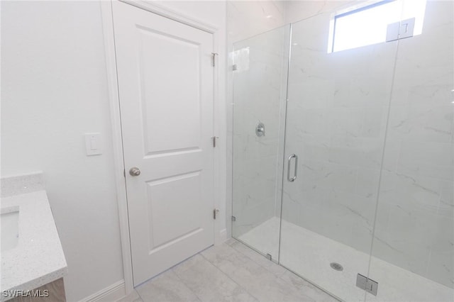 1456 Rugby Ln, Labelle, FL 33935 - full bath featuring a marble finish shower, vanity, and marble look tiles