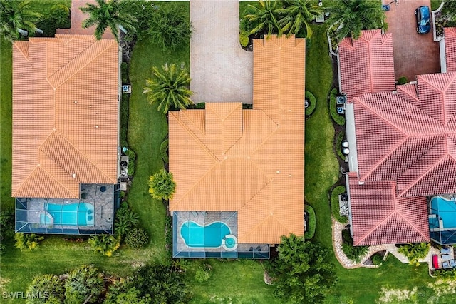 1387 Mockingbird Dr, Naples, FL 34120 - drone / aerial view of a pool