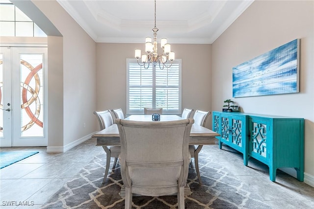 1387 Mockingbird Dr, Naples, FL 34120 - dining area featuring a chandelier, ornamental molding, french doors, and a tray ceiling