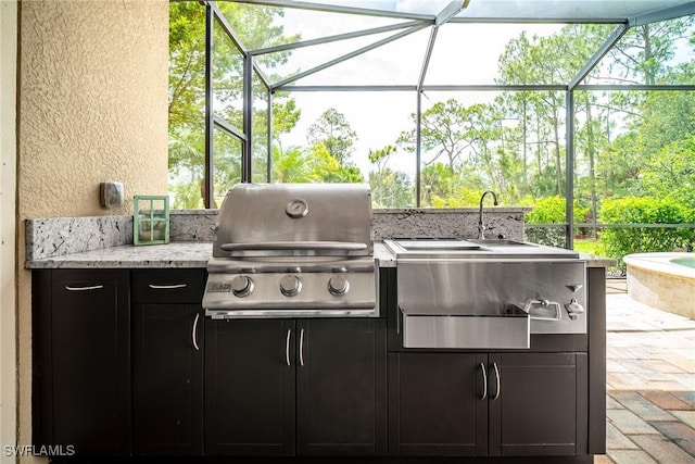 1387 Mockingbird Dr, Naples, FL 34120 - view of patio / terrace with exterior kitchen and a lanai