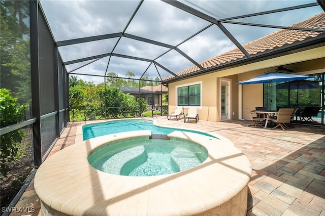 1387 Mockingbird Dr, Naples, FL 34120 - view of swimming pool with a patio area, a pool with connected hot tub, ceiling fan, and glass enclosure