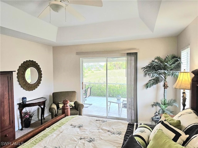 619 Charles Sise St, Lehigh Acres, FL 33974 - bedroom with a tray ceiling, access to outside, and ceiling fan