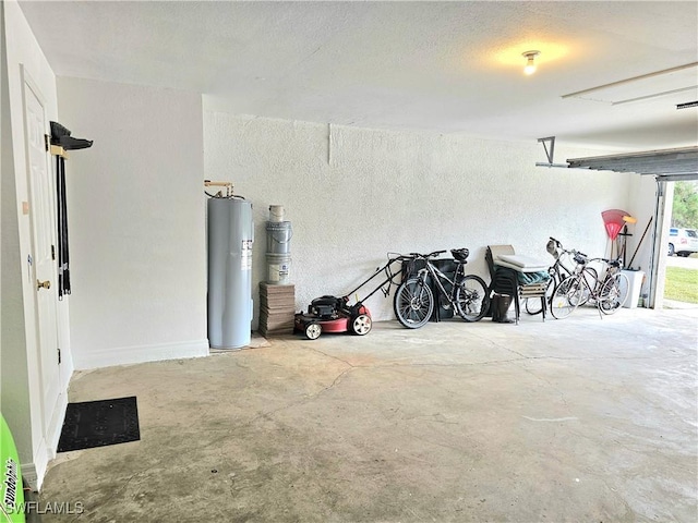 619 Charles Sise St, Lehigh Acres, FL 33974 - garage with water heater and a textured wall